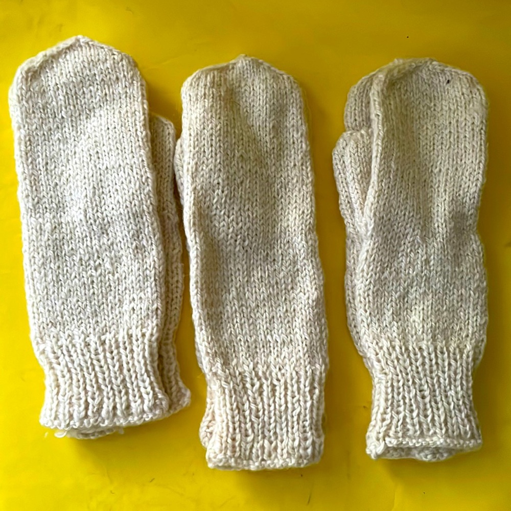Cream hand knitted wool mittens